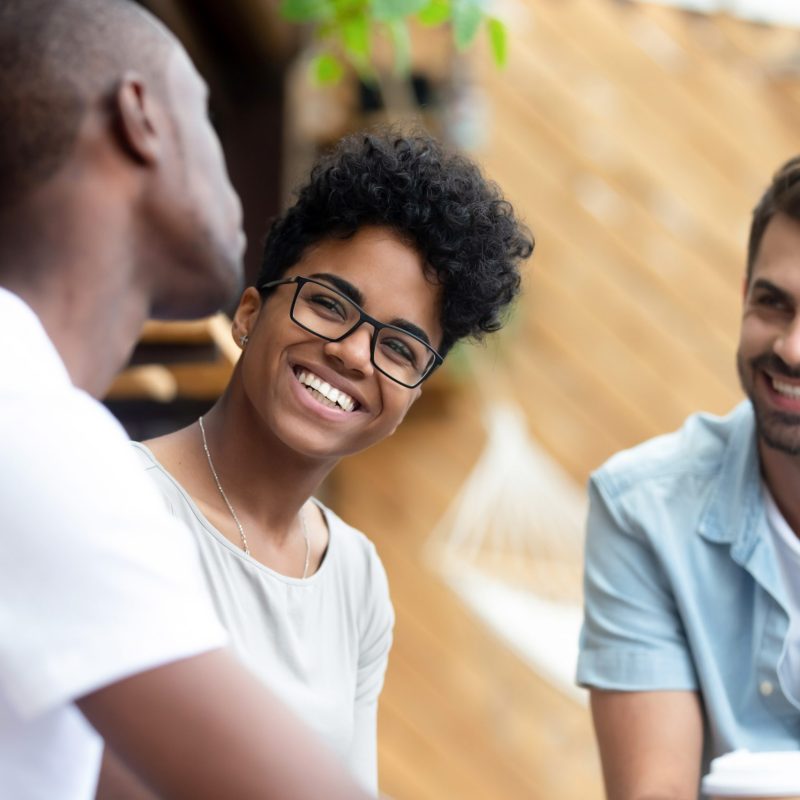 three-young-diverse-smiling-people