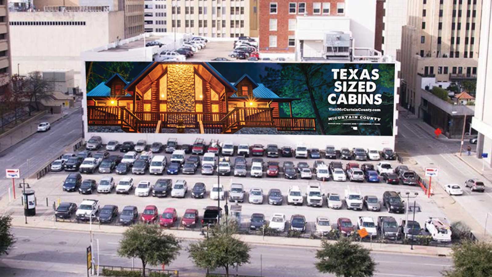 Award-winning, gigantic McCurtain County Tourism Authority cabin wallscape in Dallas, Texas