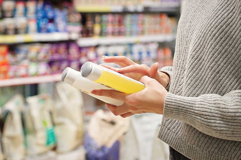 A photo of a person shopping for supplies donations at a store